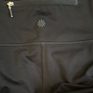 Black Athleta leggings. Reflective bottom, GUC Small with 25’ inseam